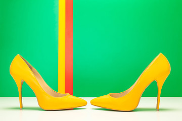 Image showing pair of yellow high heels