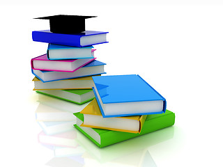 Image showing Graduation hat with books