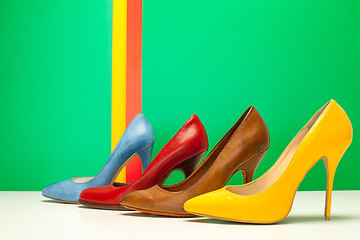 Image showing different color of high heels 