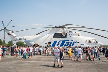 Image showing People explore the MI-26T helicopter