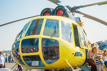 Image showing Visitors exploring the MI-8 helicopter