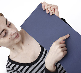 Image showing Woman holding a paper