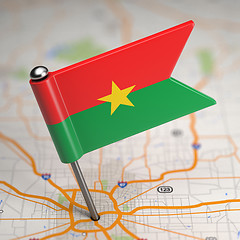 Image showing Burkina Faso Small Flag on a Map Background.