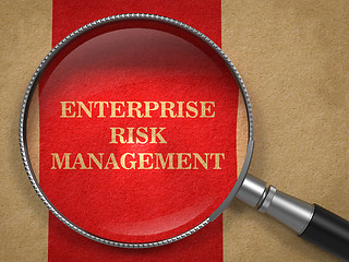 Image showing Enterprise Risk Management. Magnifying Glass on Old Paper.