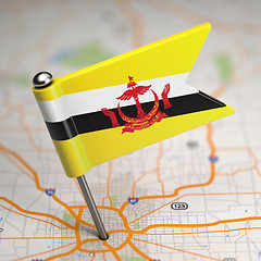 Image showing Brunei Small Flag on a Map Background.