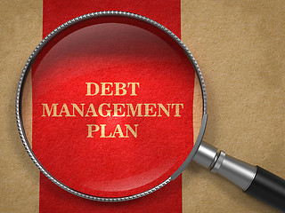 Image showing Debt Management Plan. Magnifying Glass on Old Paper.