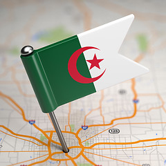 Image showing Algeria Small Flag on a Map Background.