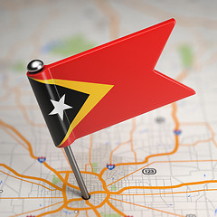 Image showing East Timor Small Flag on a Map Background.