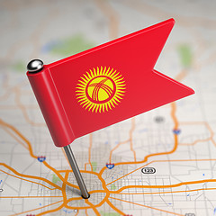 Image showing Kyrgyzstan Small Flag on a Map Background.