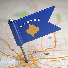 Image showing Kosovo Small Flag on a Map Background.