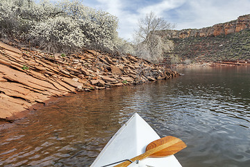 Image showing springtime canoe paddling