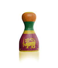 Image showing Wooden pawn with a flag painting