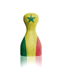 Image showing Wooden pawn with a flag painting