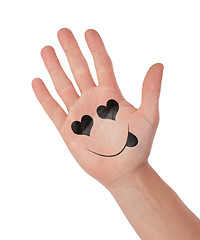 Image showing Hand with smiley isolated on white, concept of communication