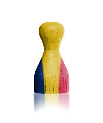 Image showing Wooden pawn with a flag painting