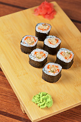 Image showing sushi rolls with tobico and pancake