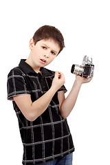 Image showing young boy with old vintage analog SLR camera