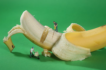 Image showing Construction Workers in Conceptual Food Imagery With Banana