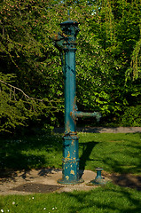 Image showing The old cast iron water pump.