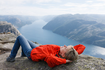 Image showing Woman hiker on Pulpit Rock / Preikestolen, Norway