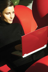 Image showing young woman using laptop hukm