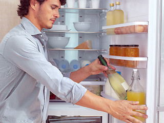Image showing Man near Refrigerator