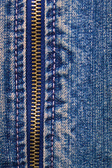 Image showing metal zipper with denim