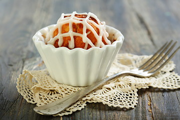 Image showing Cupcake with icing and fork.