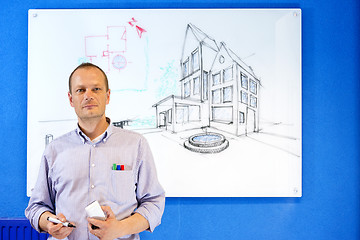 Image showing Architect in front of white board