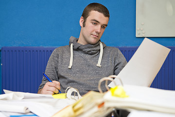 Image showing cluttered desk