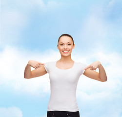 Image showing smiling woman in blank white t-shirt