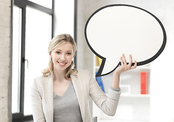 Image showing smiling businesswoman with blank text bubble