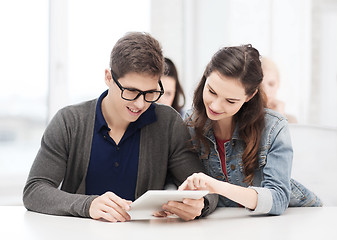 Image showing students looking at tablet pc in lecture at school