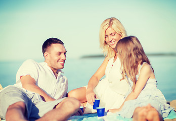 Image showing happy family having a picnic