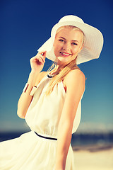 Image showing beautiful woman enjoying summer outdoors