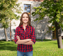 Image showing smiling young woman in casual clothes