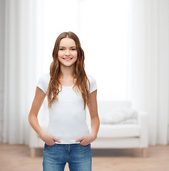 Image showing smiling teenager in blank white t-shirt