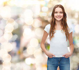 Image showing smiling teenager in blank white t-shirt