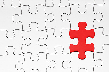 Image showing Red puzzle piece 