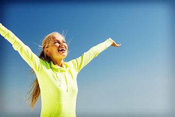 Image showing woman doing sports outdoors