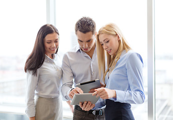 Image showing business team working with tablet pcs in office