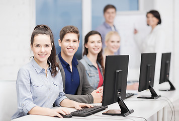 Image showing students with computer monitor at school