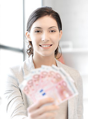 Image showing lovely woman with euro cash money