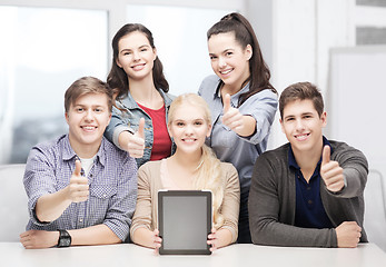 Image showing smiling students with blank tablet pc screen