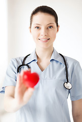 Image showing female doctor with heart