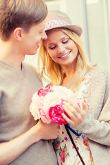 Image showing couple with flowers in the city