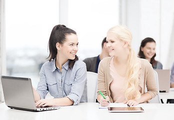 Image showing students with laptop, tablet pc and notebooks