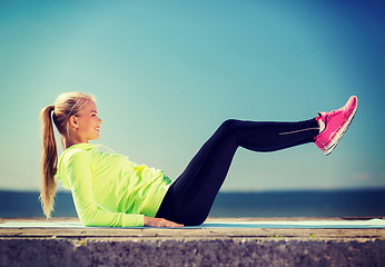 Image showing woman doing sports outdoors