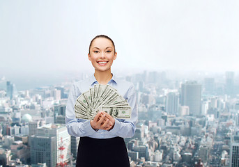 Image showing young businesswoman with dollar cash money