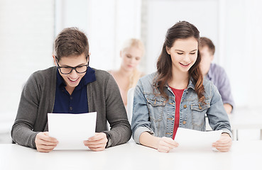 Image showing two teenagers looking at test or exam results